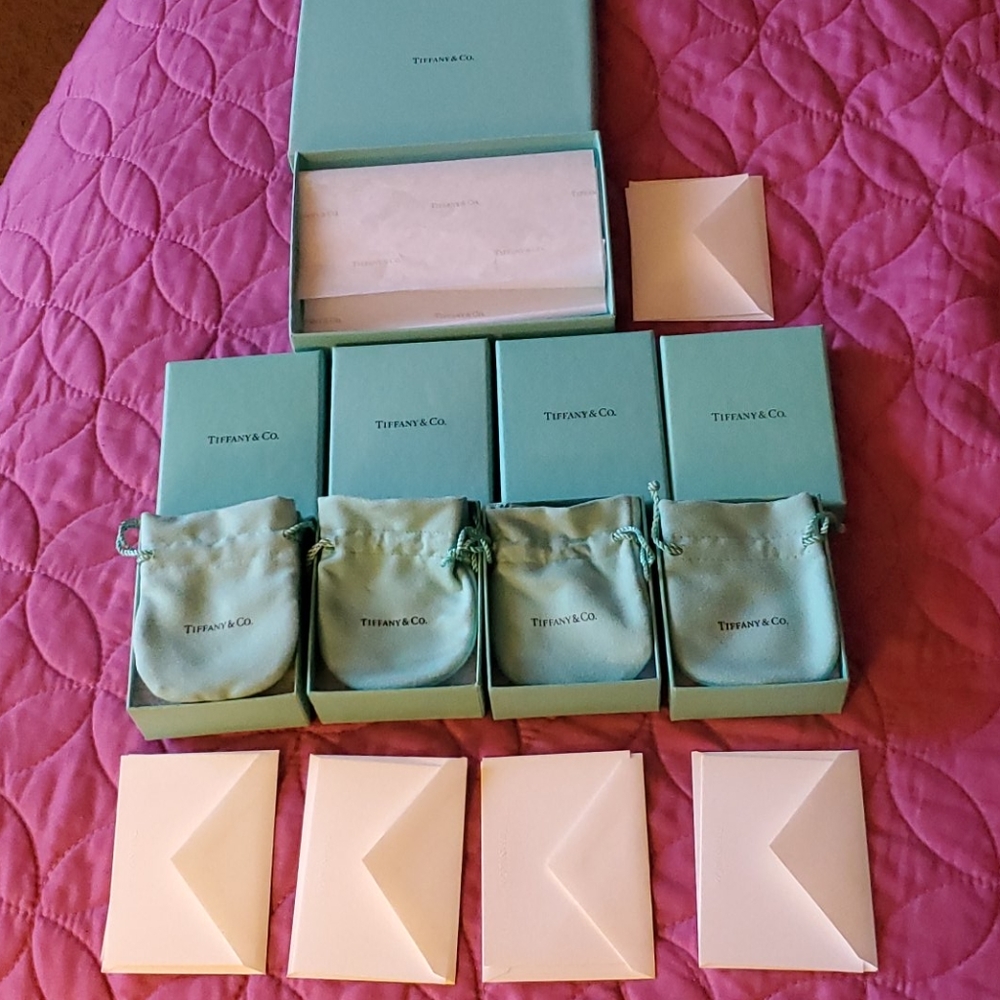 Five empty Tiffany boxes.